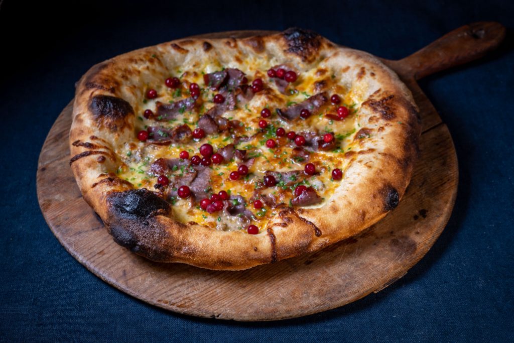 Norwegian pizza with fenalår and lingonberries