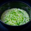 Jerusalem artichoke soup with hazelnuts split with parsley oil