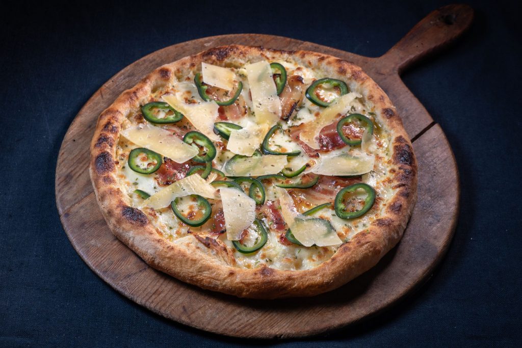 Pizza Bianco with honey cured bacon, rosemary & jalapeño peppers SY