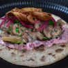 Norwegian raindeer tacos in Potetkaker with lingonberry cream & crisp parsnip